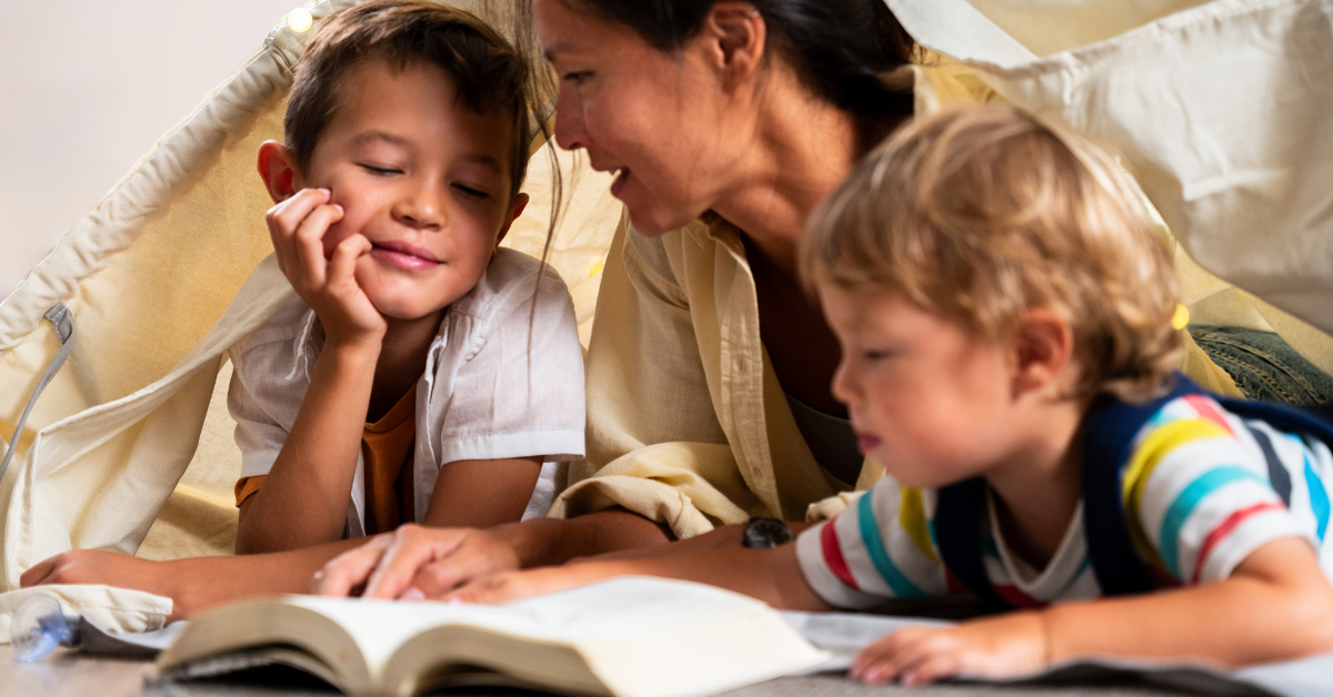 Mom reading the bible with children