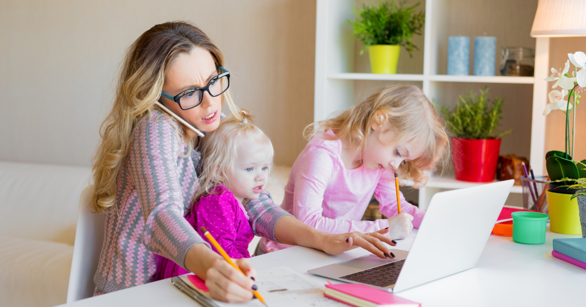 Mom working and taking care of kids
