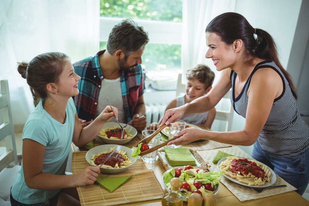 Family enjoying dinner together