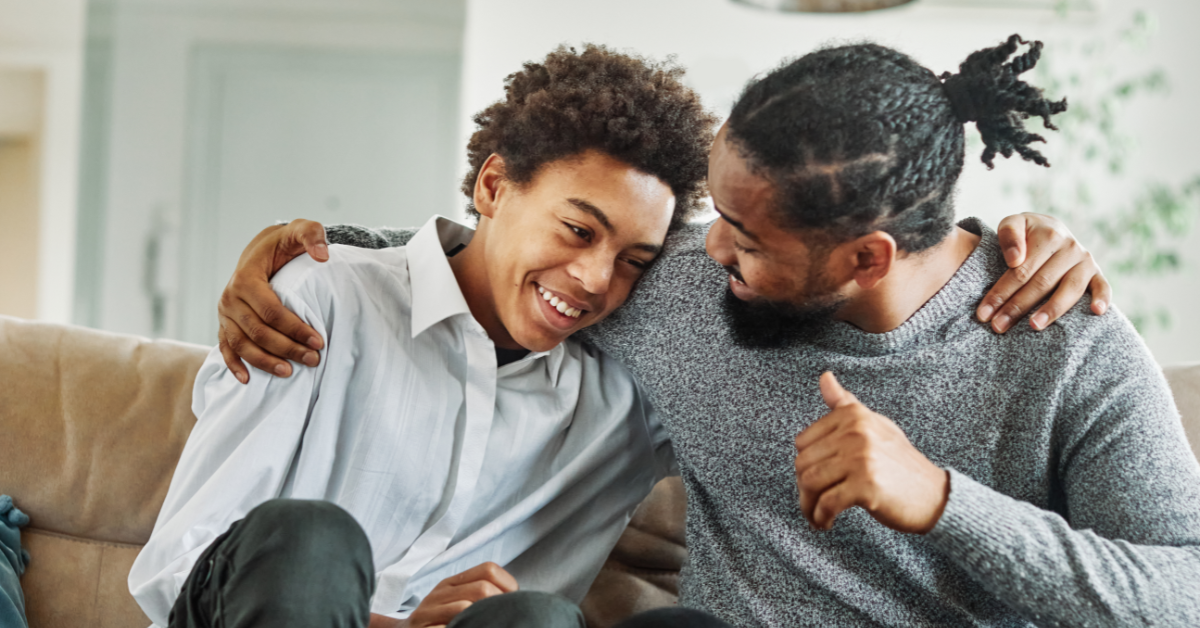 father and son happy conversation