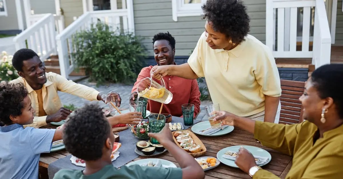 family eating dinner outside