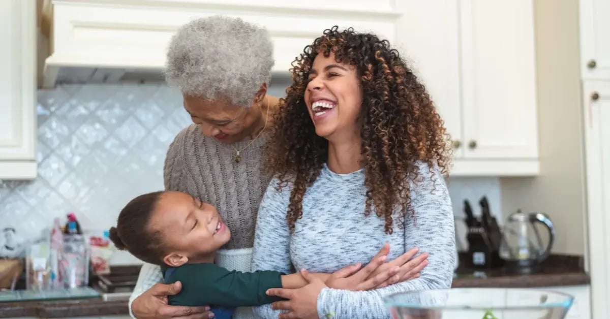 Family Hugging in Kitchen