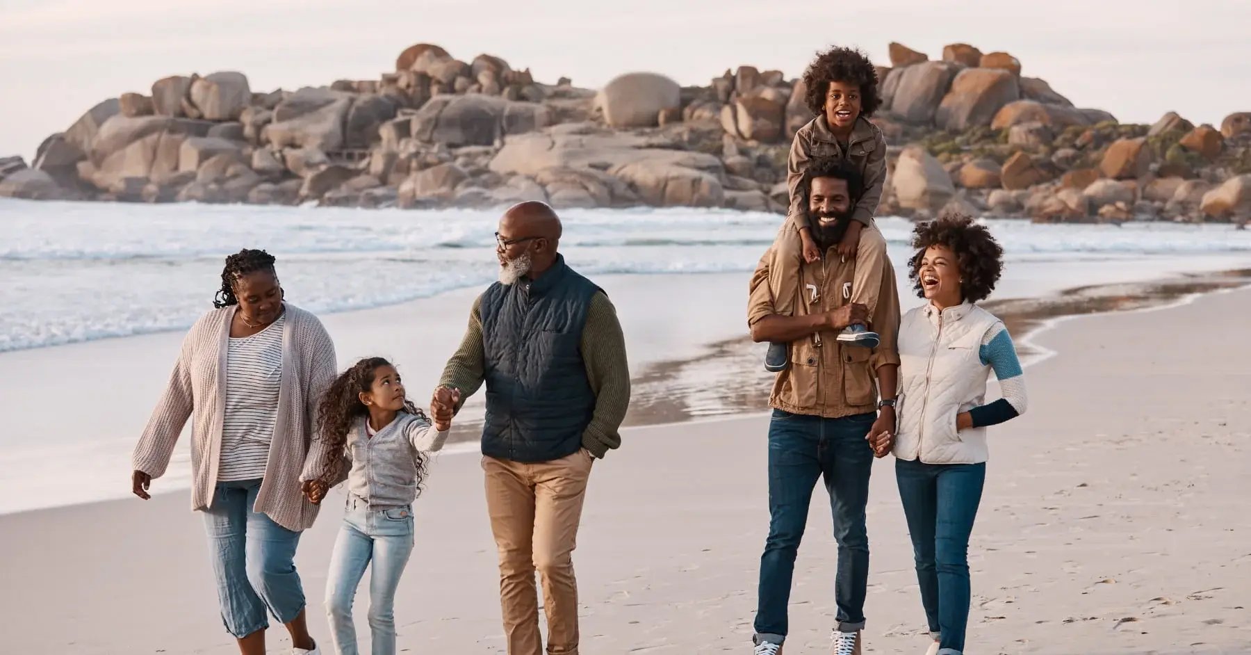 family walking on beach