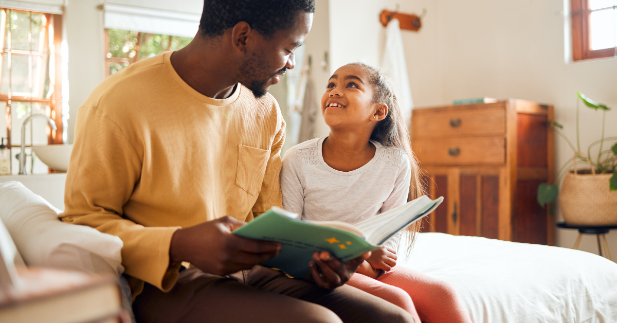 father-and-daughter-reading-a-bedtime-story