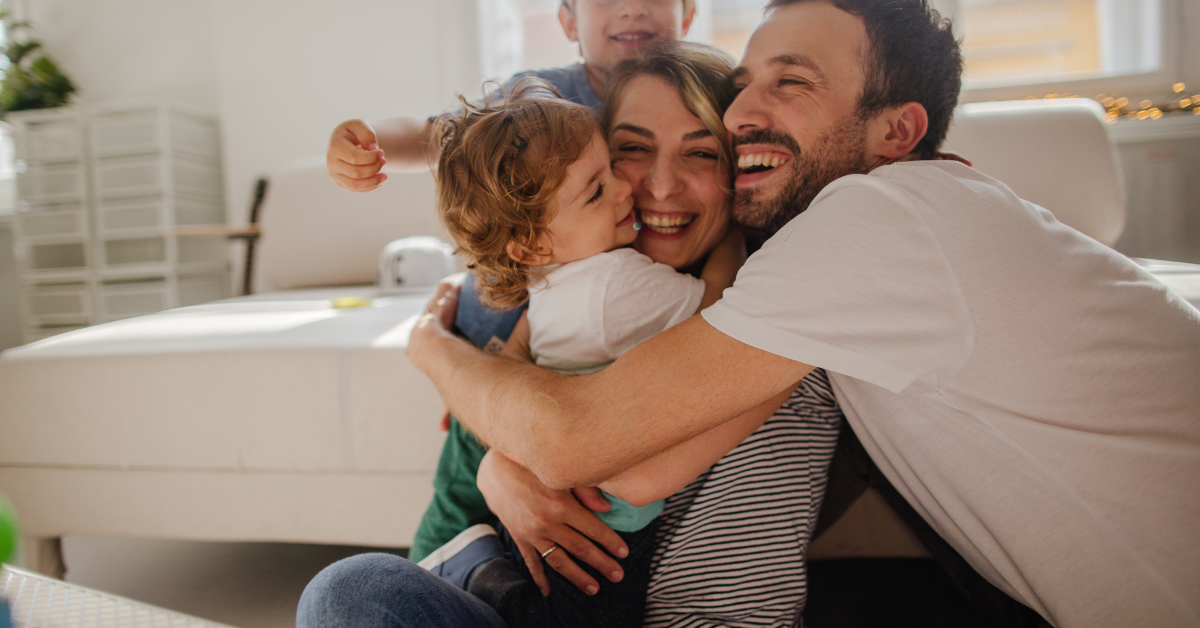 family-hugging-and-celebrating-with-eachother