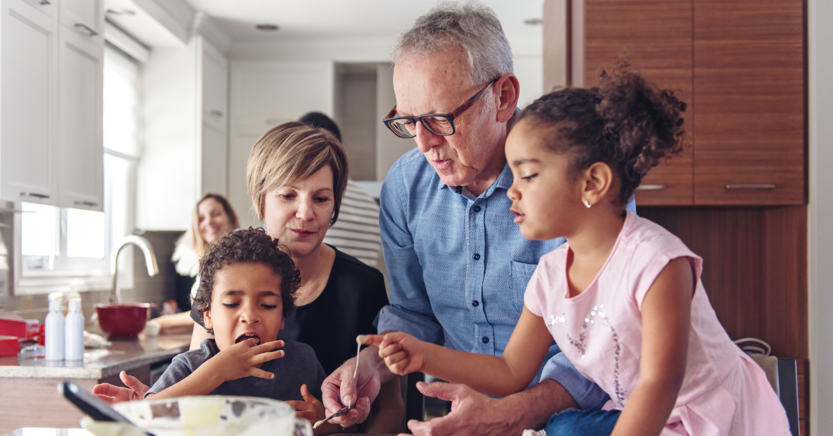 grandparents-and-grandkids-baking-together-in-kitchen