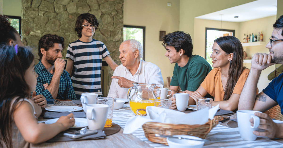 grandparents-and-kids-talking-around-the-dinner-table