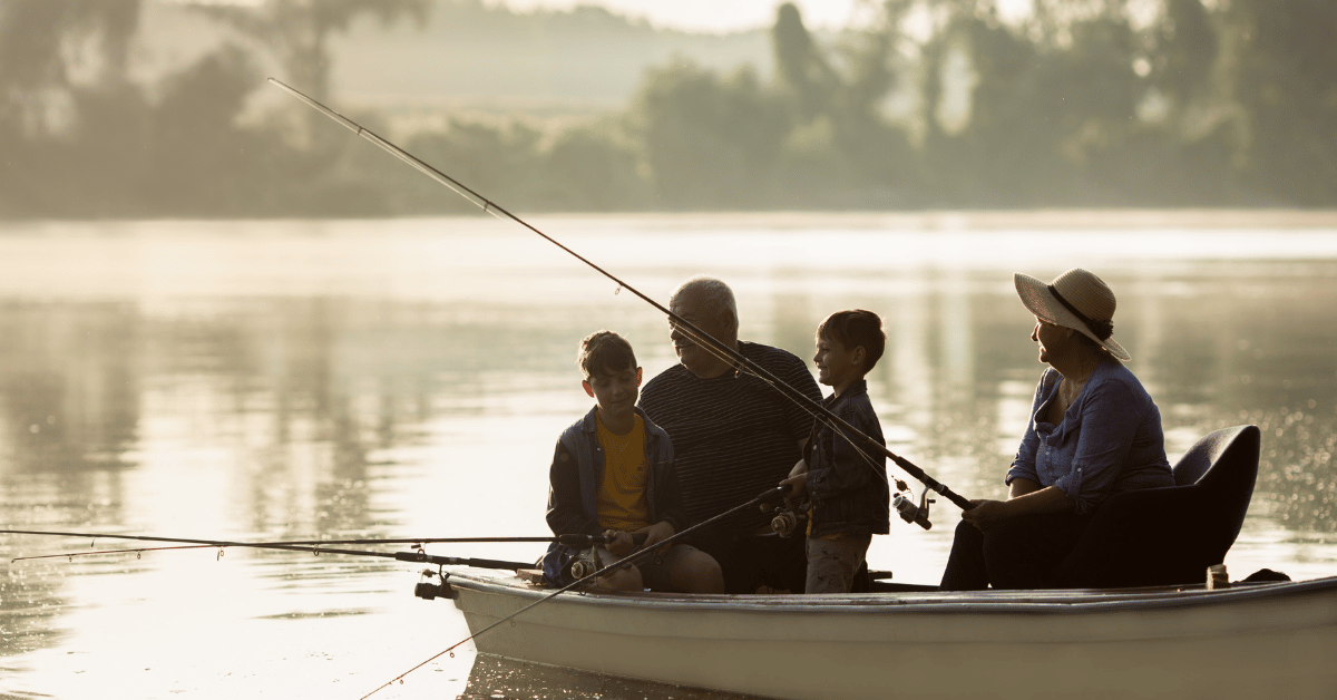 Grandparents fishing with kids