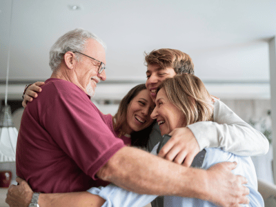 family hugging practicing communication